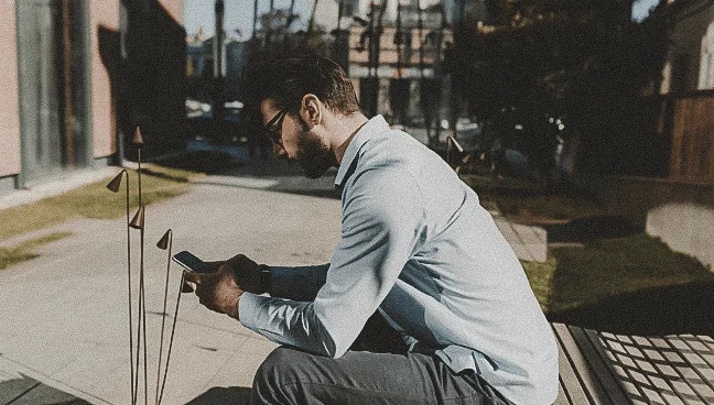 Property manager outside among landscape